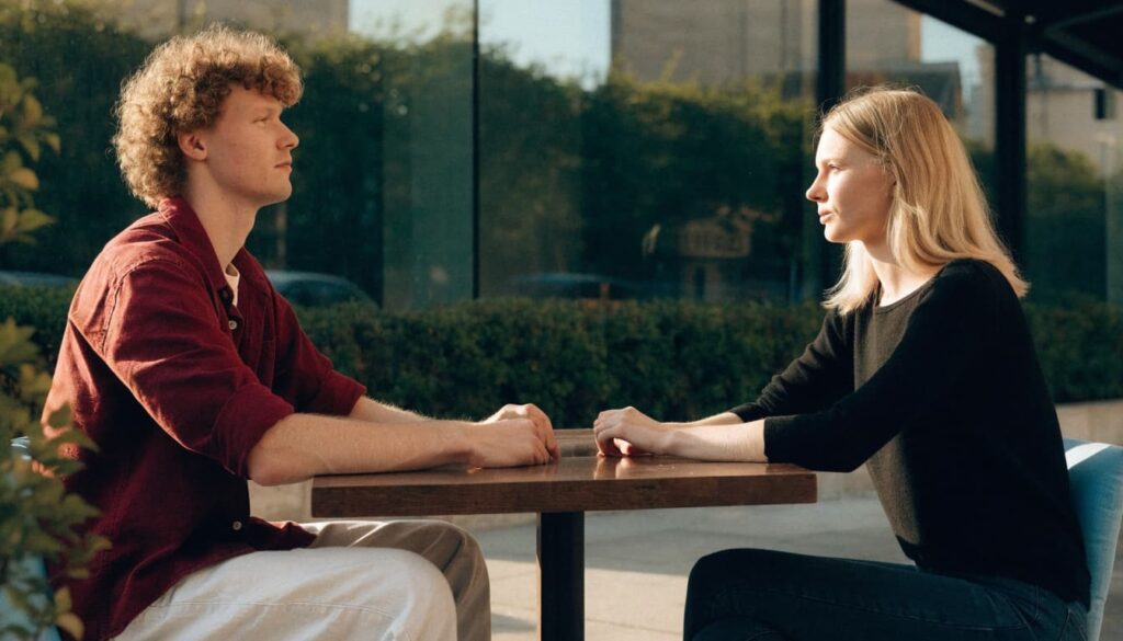 Limerence vs. Love: What the Difference Can and Can’t Tell You 5 Man and woman talking together at an outdoor café